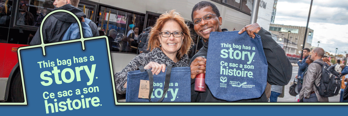 Two people holding up library tote bags