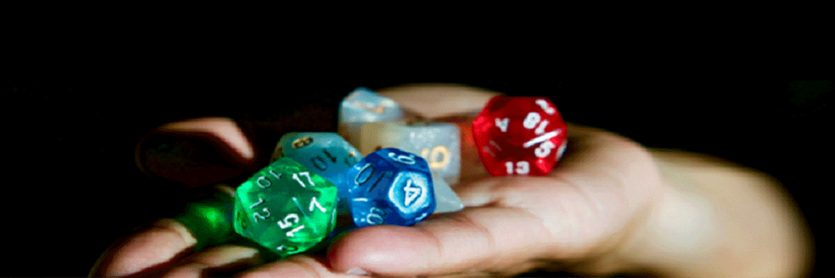 D&D for Kids with image of hand holding dice