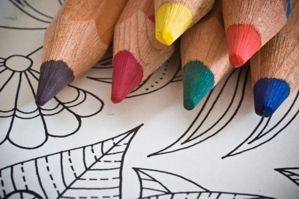Colouring book and coloured pencils