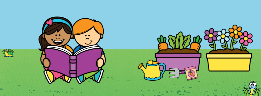 Two children sit on grass, reading together near two planters growing flowers and vegetables.