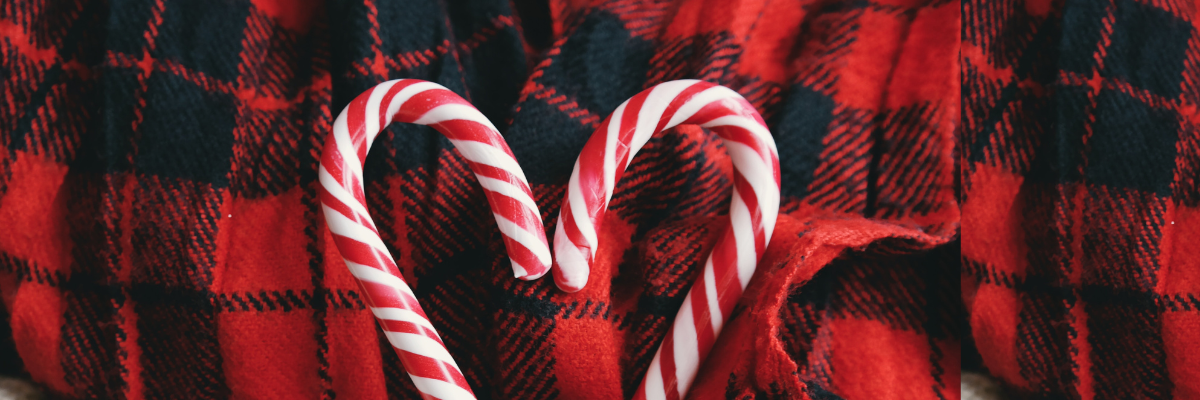 heart shaped candy cane on a flannel background