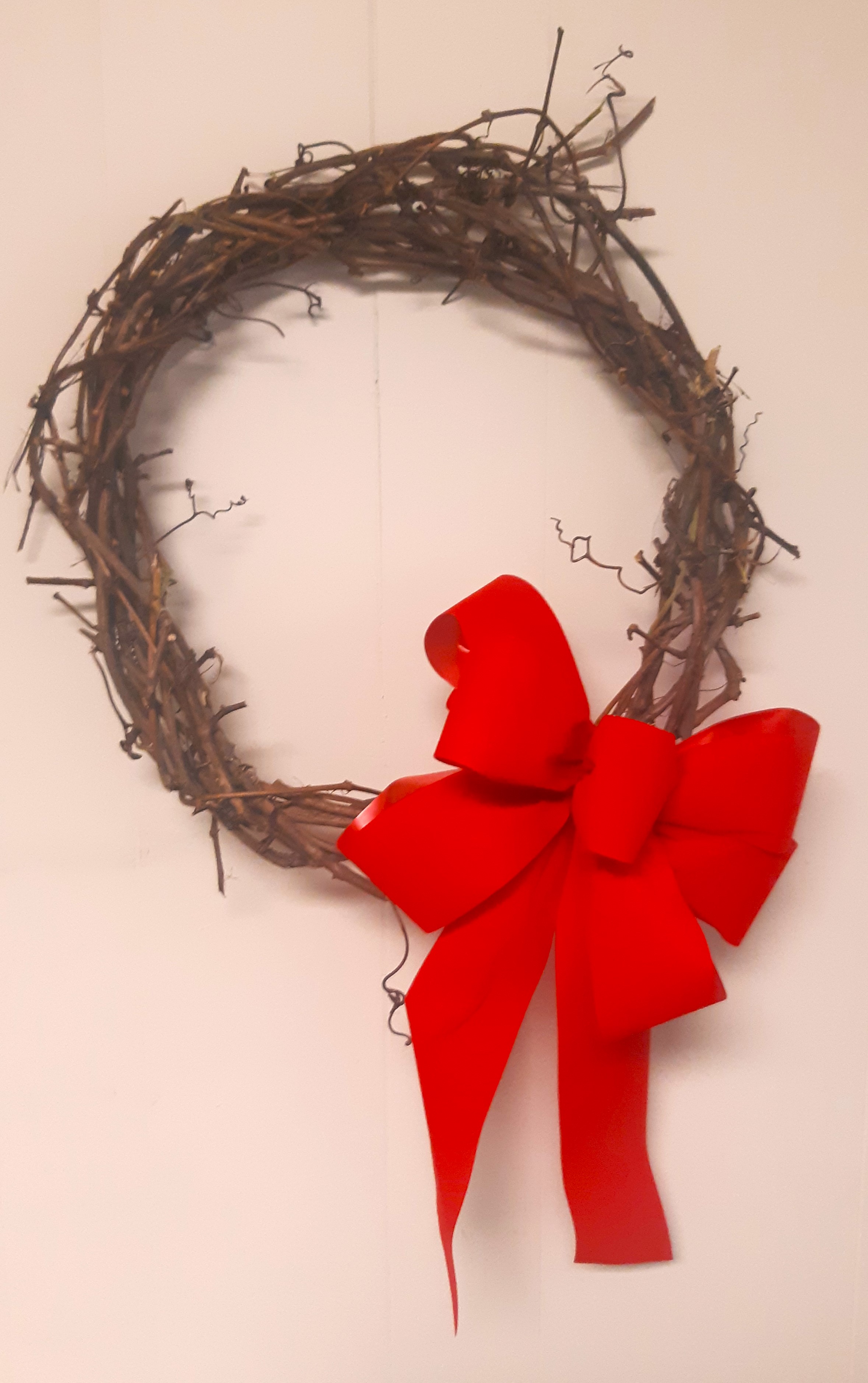 vine wreath with red velvet bow
